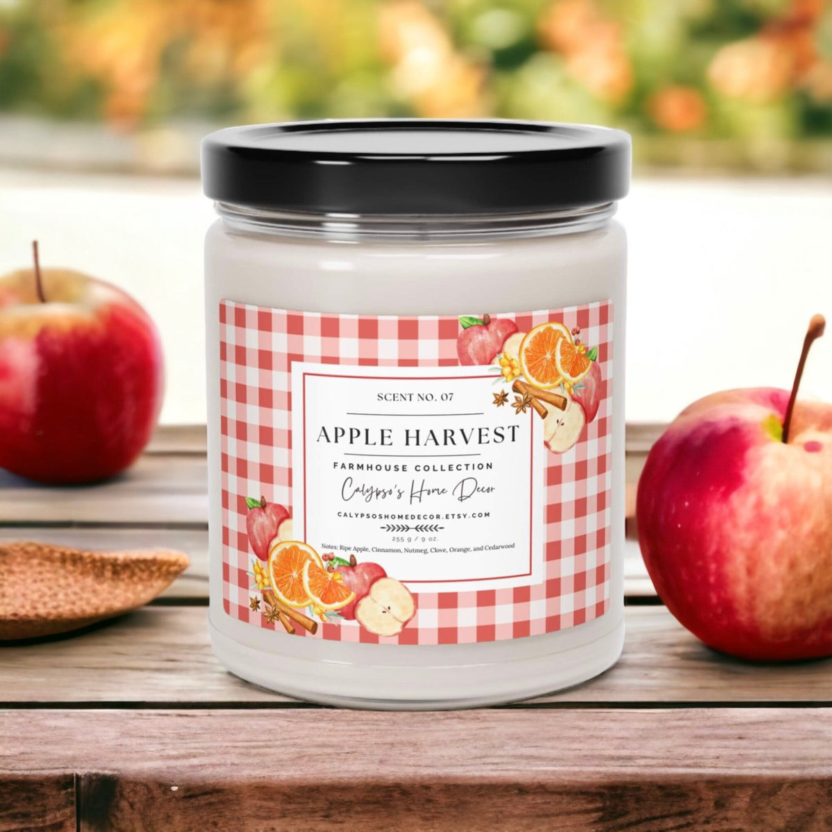 Apple Harvest candle on wood table with gingerbread cookies and mini pumpkin
