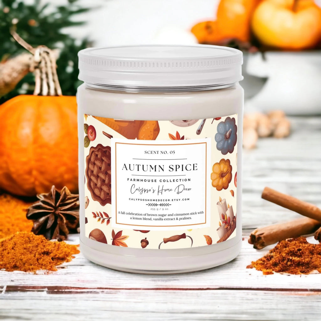 Autumn Spice candle with apple pie and pecans on wood surface
