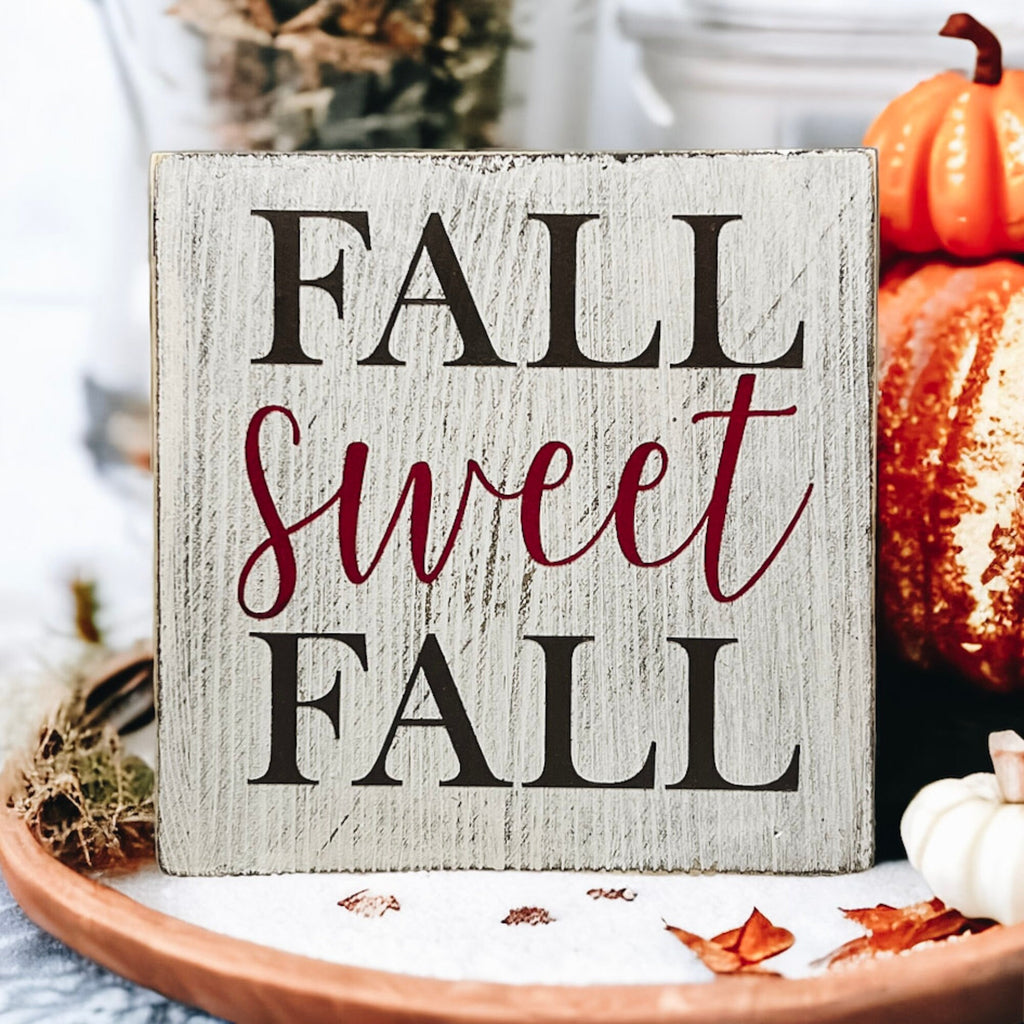 Fall Sweet Fall distressed white wood block sign product shot on white background with orange pumpkins