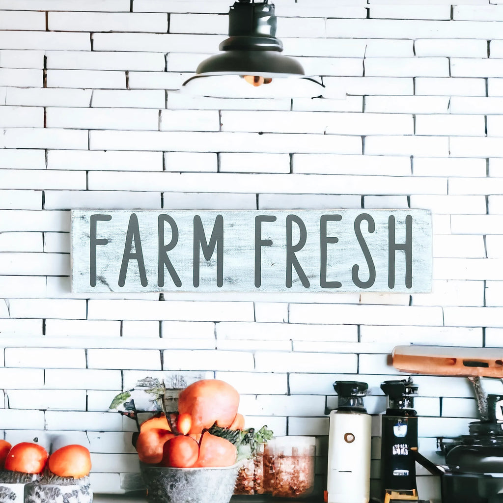 Farm Fresh distressed white wood sign with dark grey lettering on white marble counter close up product shot