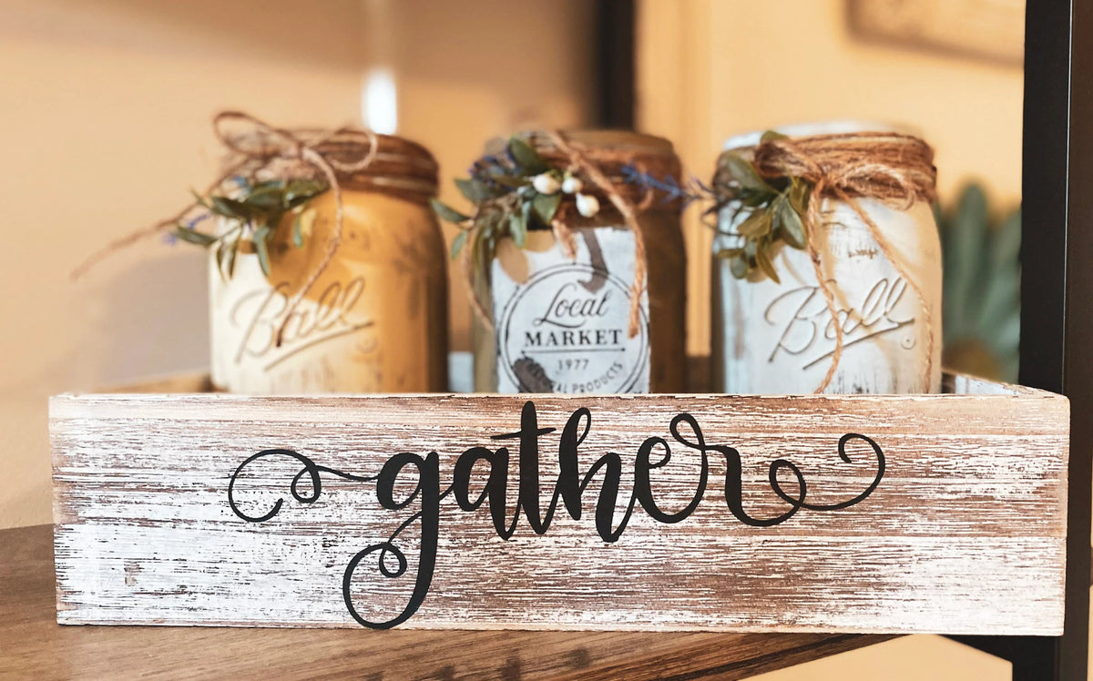 Farmhouse mason jars in whitewashed Gather tray close-up with hydrangeas and ornate vase