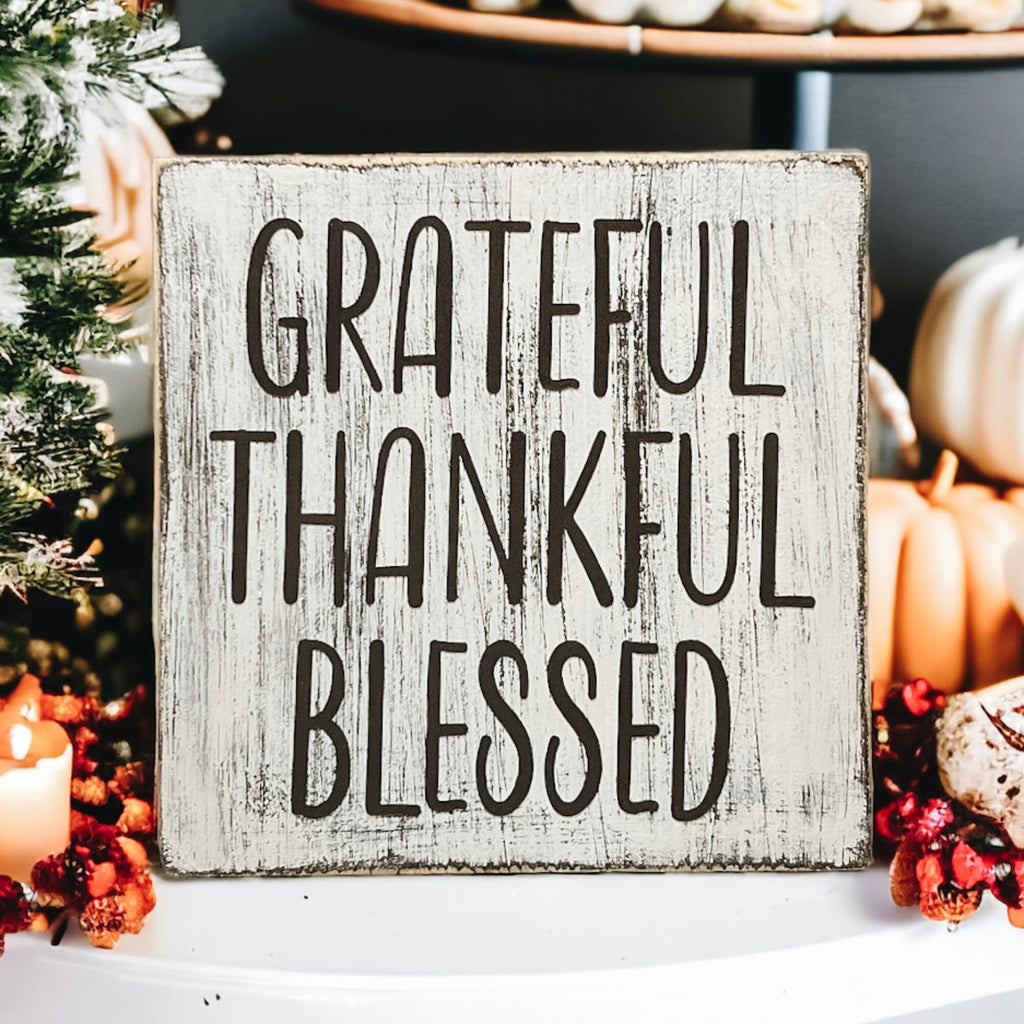 Grateful Thankful Blessed distressed white wood block sign product shot on white background