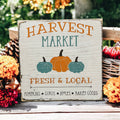 Harvest Market 5x5 wood sign with orange and teal pumpkins on rustic wood surface