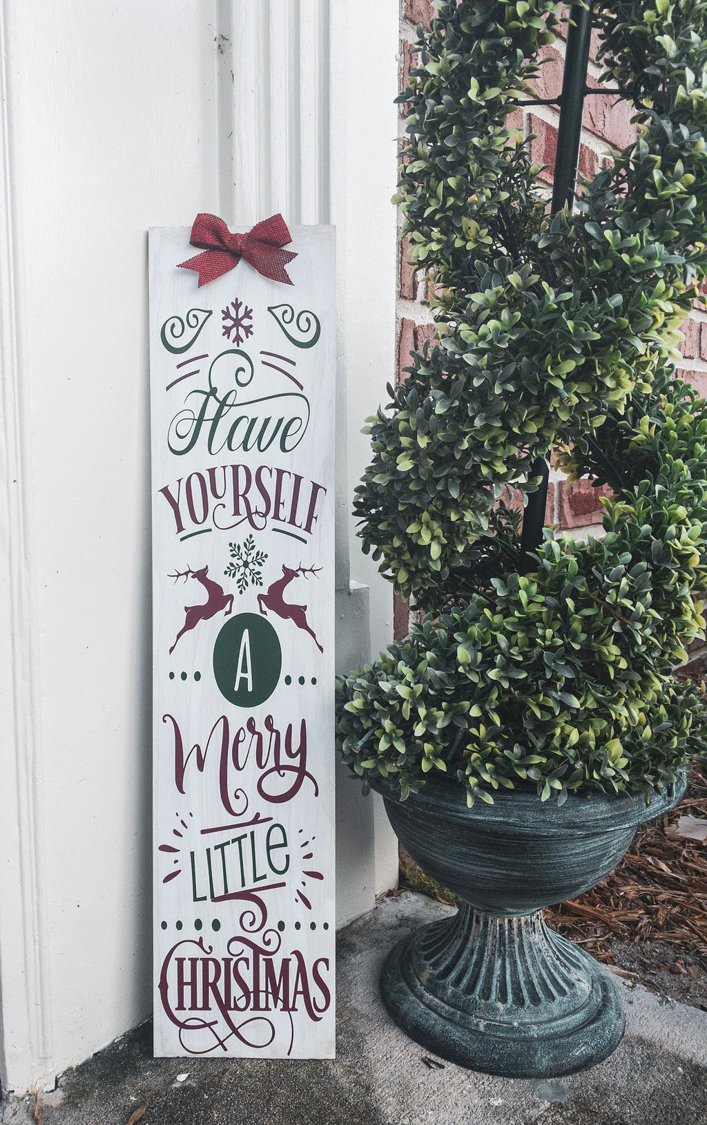 Have Yourself a Merry Little Christmas rustic wood porch leaner sign with burlap bow on white wood wall product shot