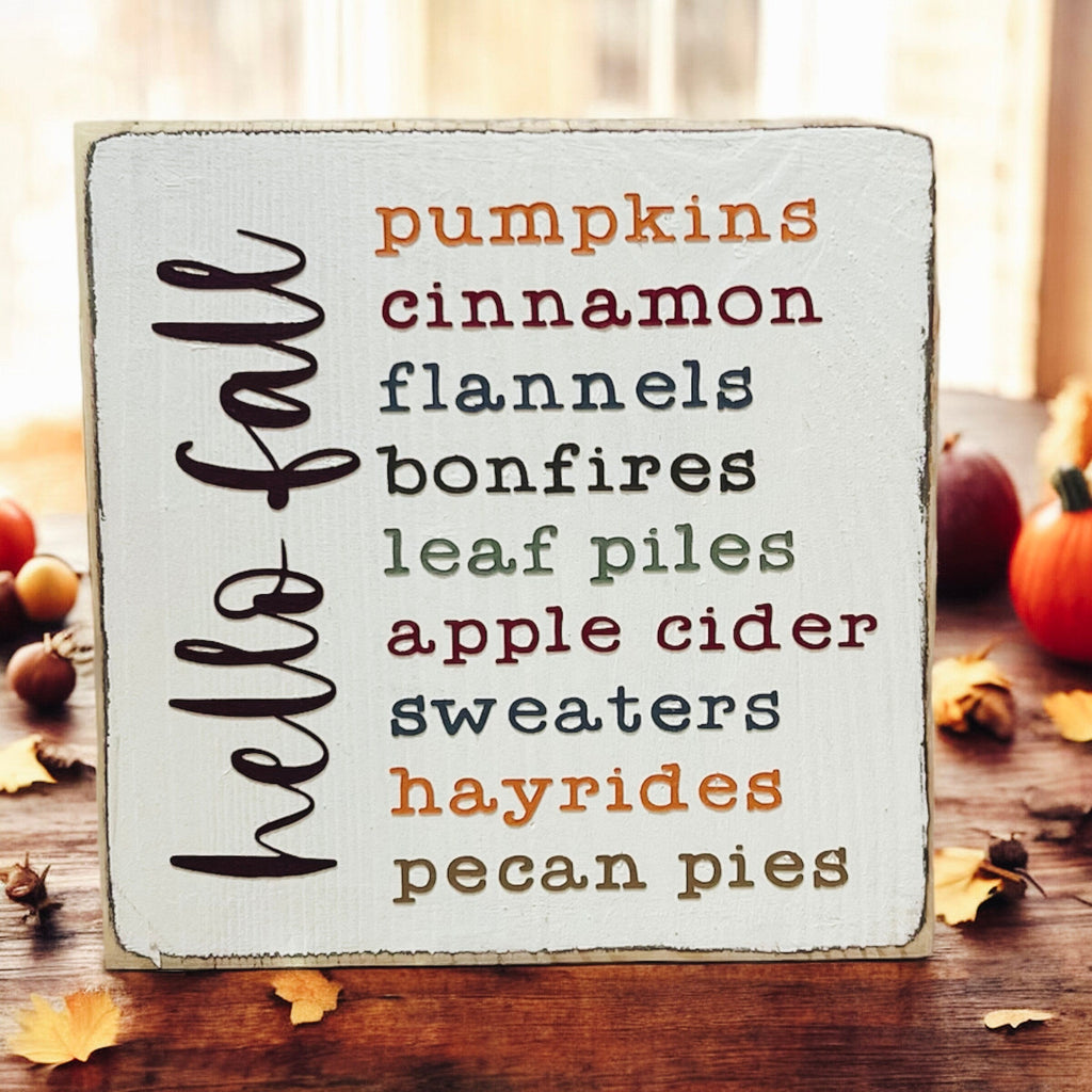 Hello Fall Favorites wood sign with pumpkins background