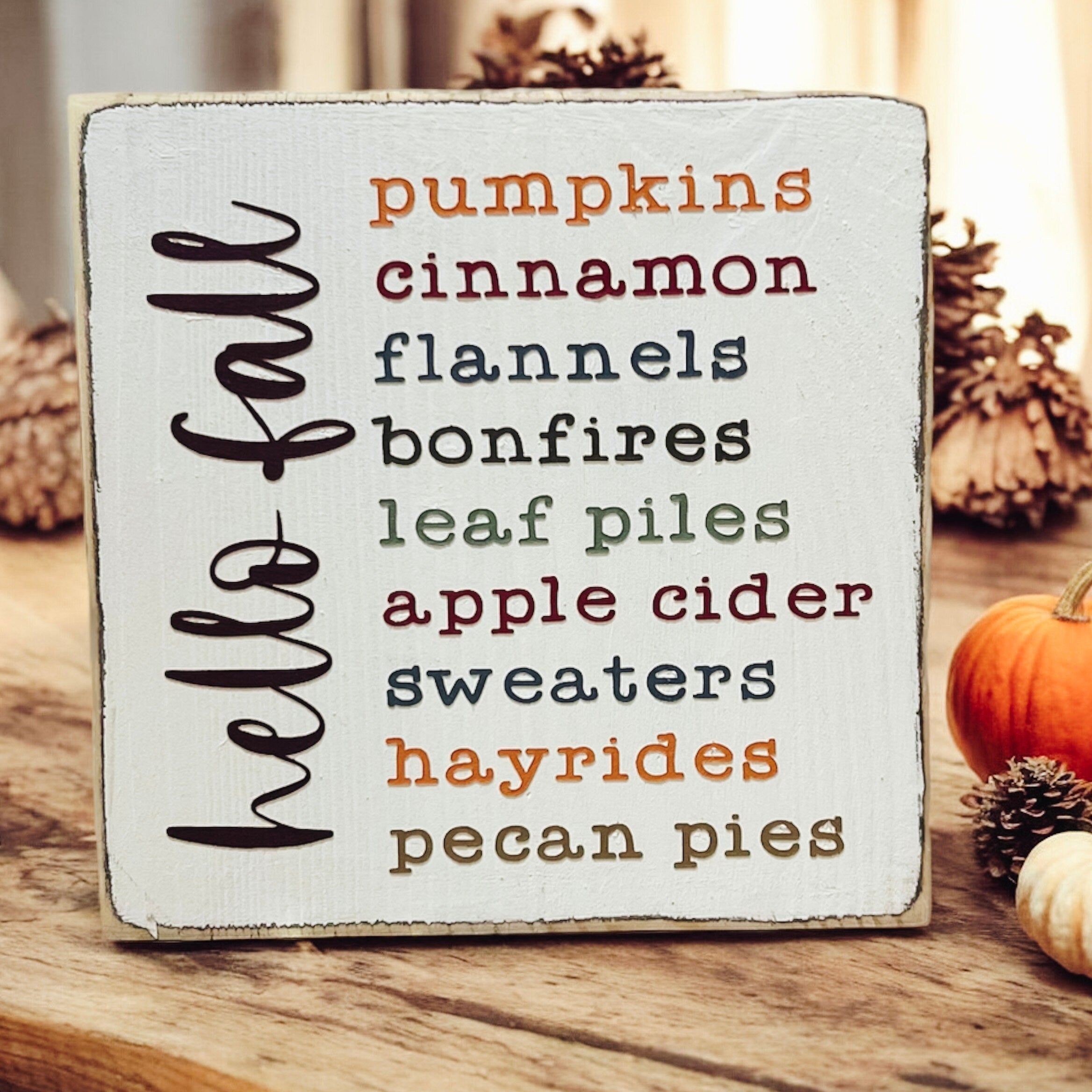 Hello Fall Favorites wood sign with autumn harvest