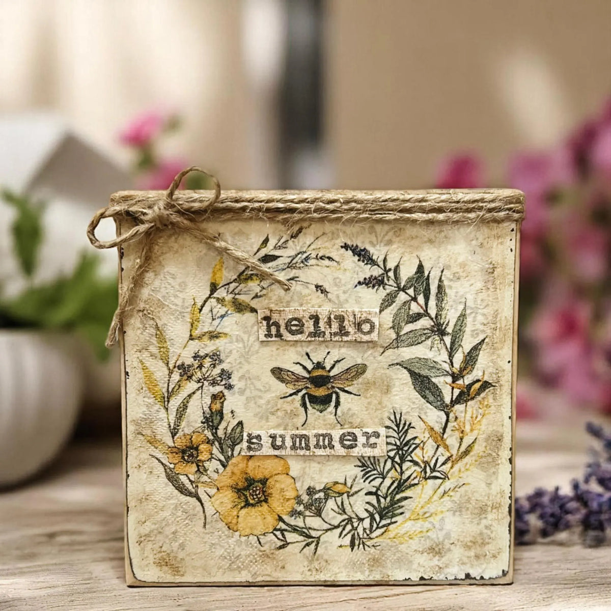 Hello Summer bee botanical wood block sign on kitchen counter with herb plants and lavender bouquet