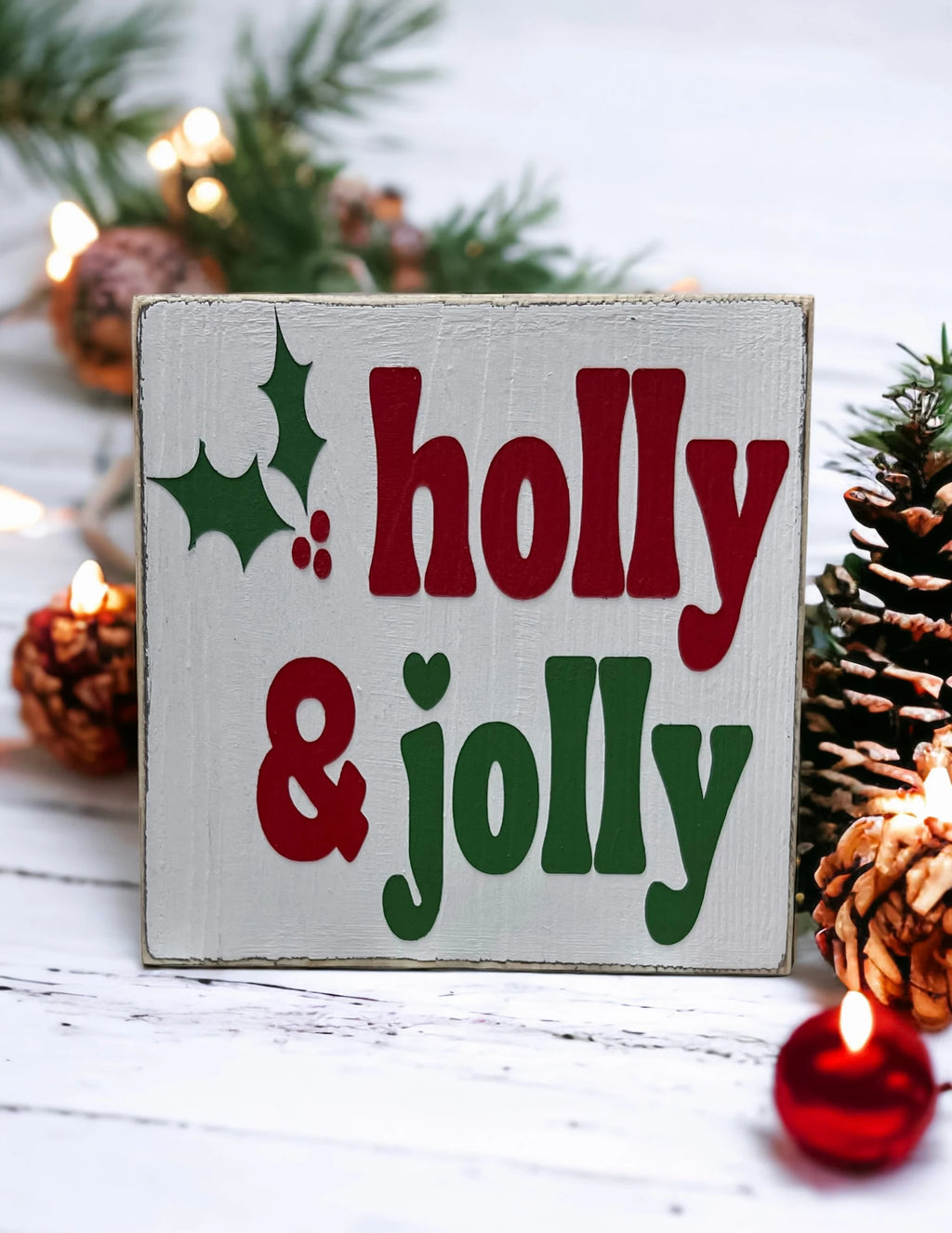 Holly & Jolly wood sign on wood tray with mini Christmas trees and red ornament