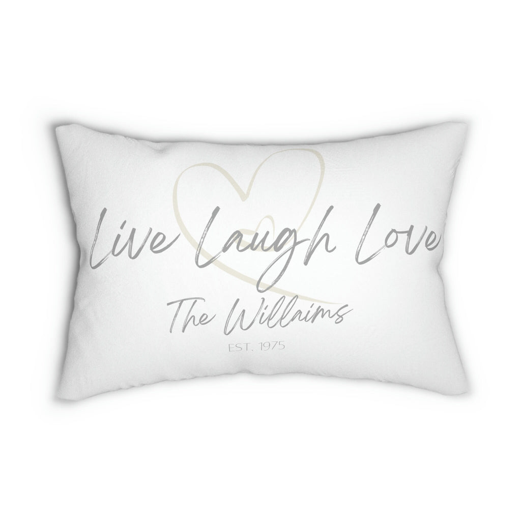 Personalized Live Laugh Love lumbar pillow on white distressed wood chair in bright room