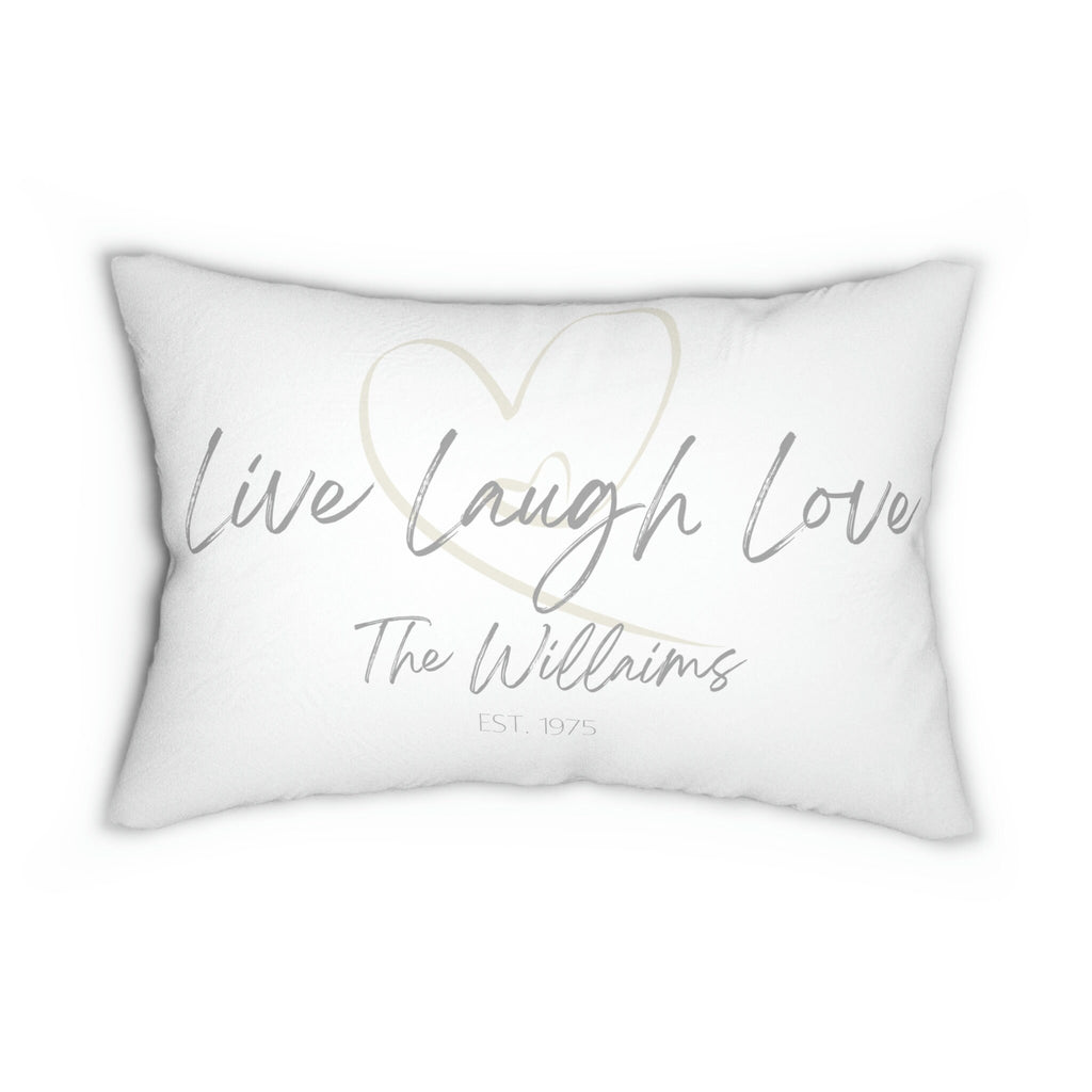 Personalized Live Laugh Love lumbar pillow on white distressed wood floor beside galvanized milk jug with fringe blanket
