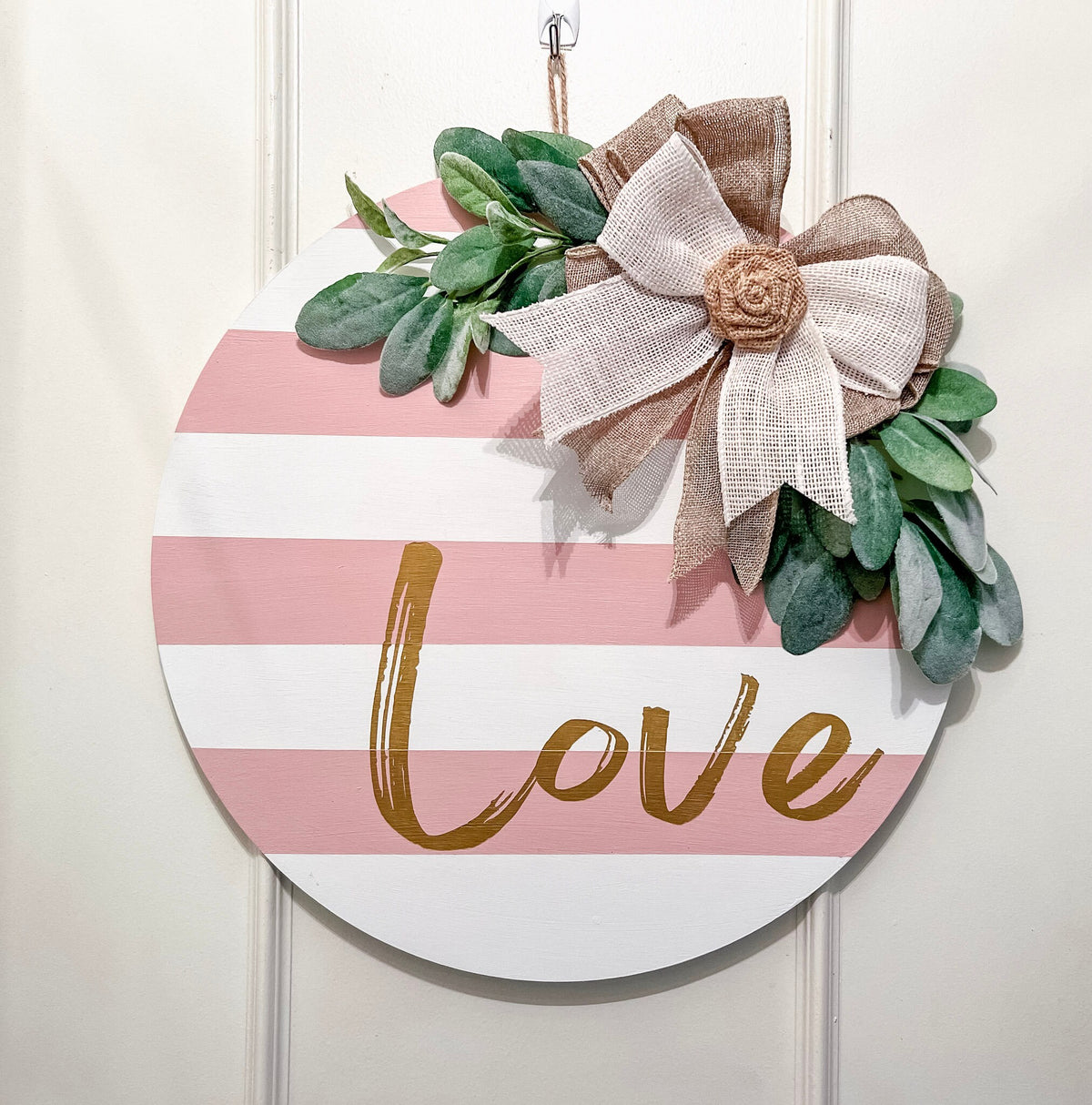 Valentine Love door hanger styled on shelf with white flowers