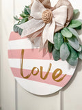 Valentine Love door hanger hanging on white door, full view