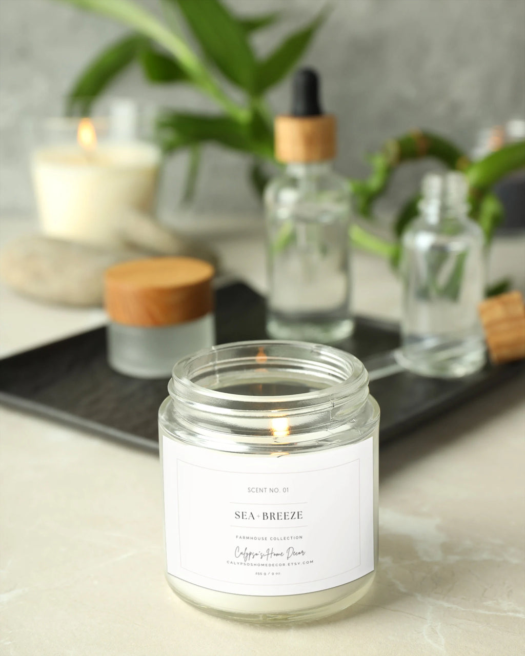 Sea Breeze candle lifestyle shot styled with farmhouse home decor