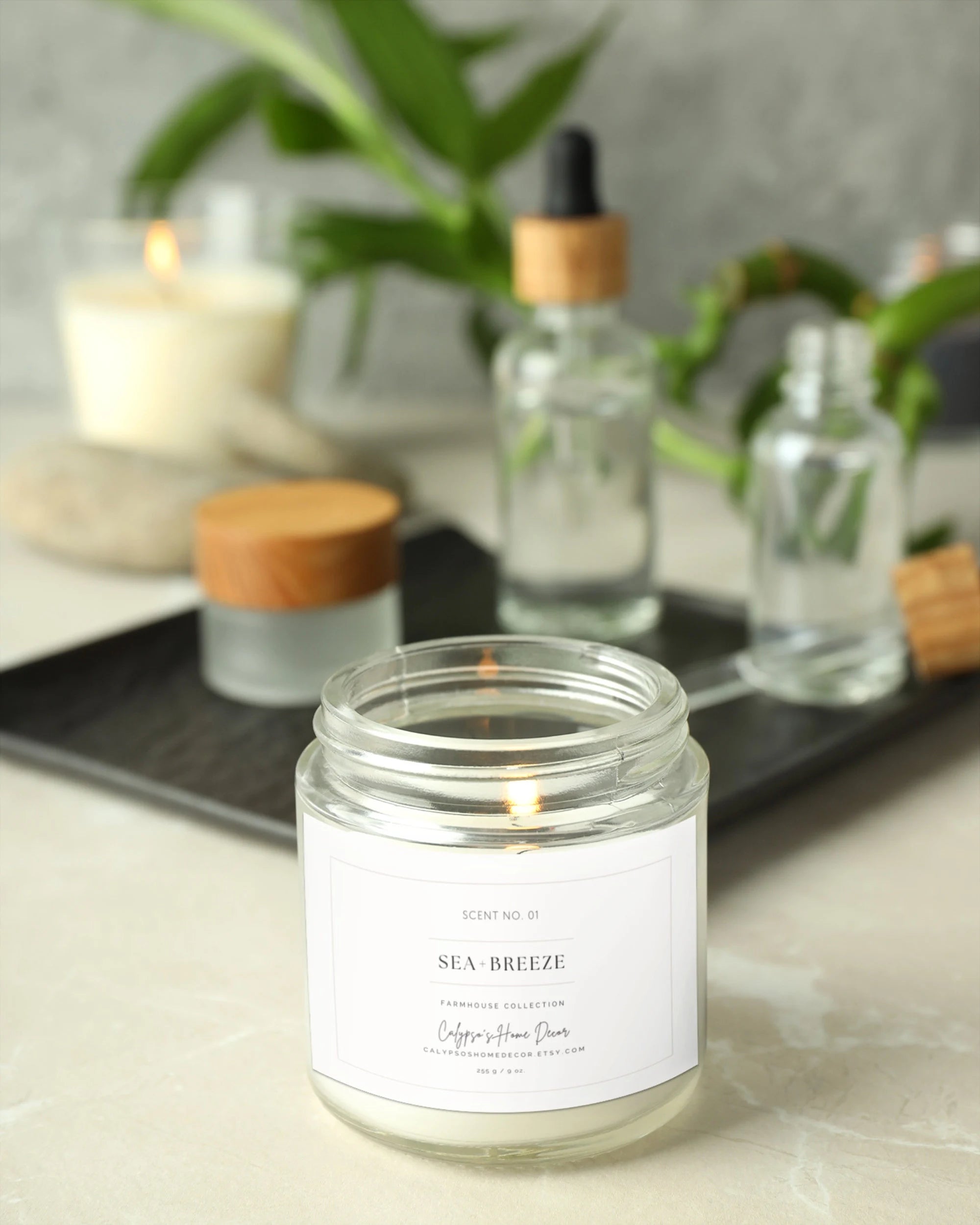 Sea Breeze candle lifestyle shot styled with farmhouse home decor