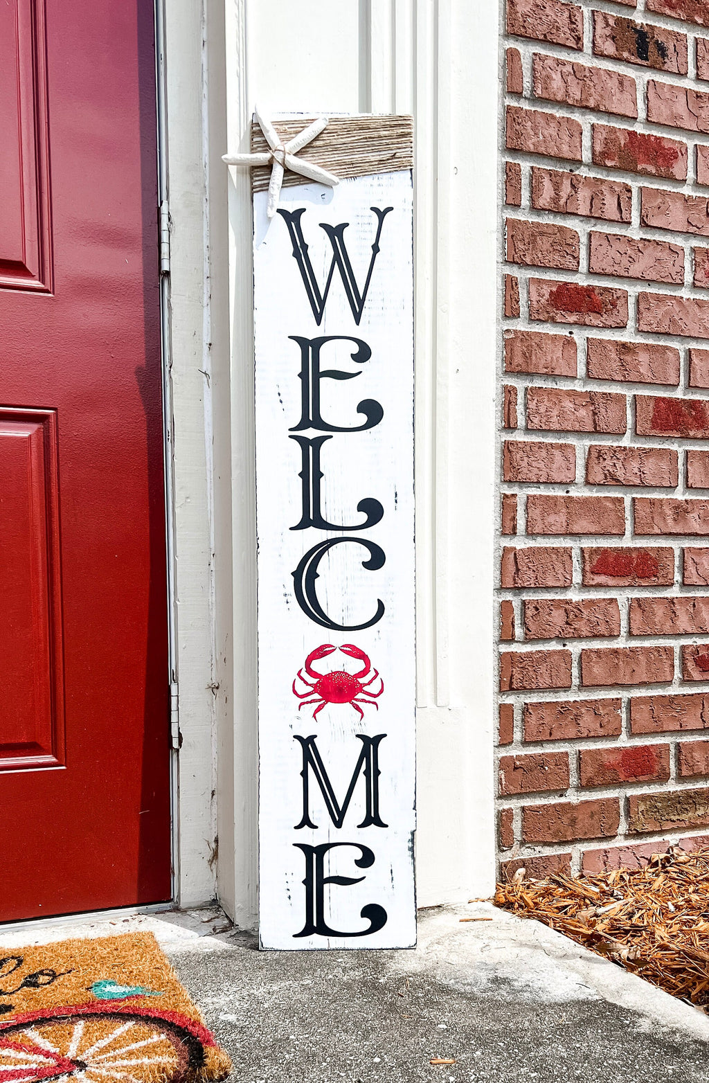 Crab Welcome porch leaner angled view showing full sign height on porch