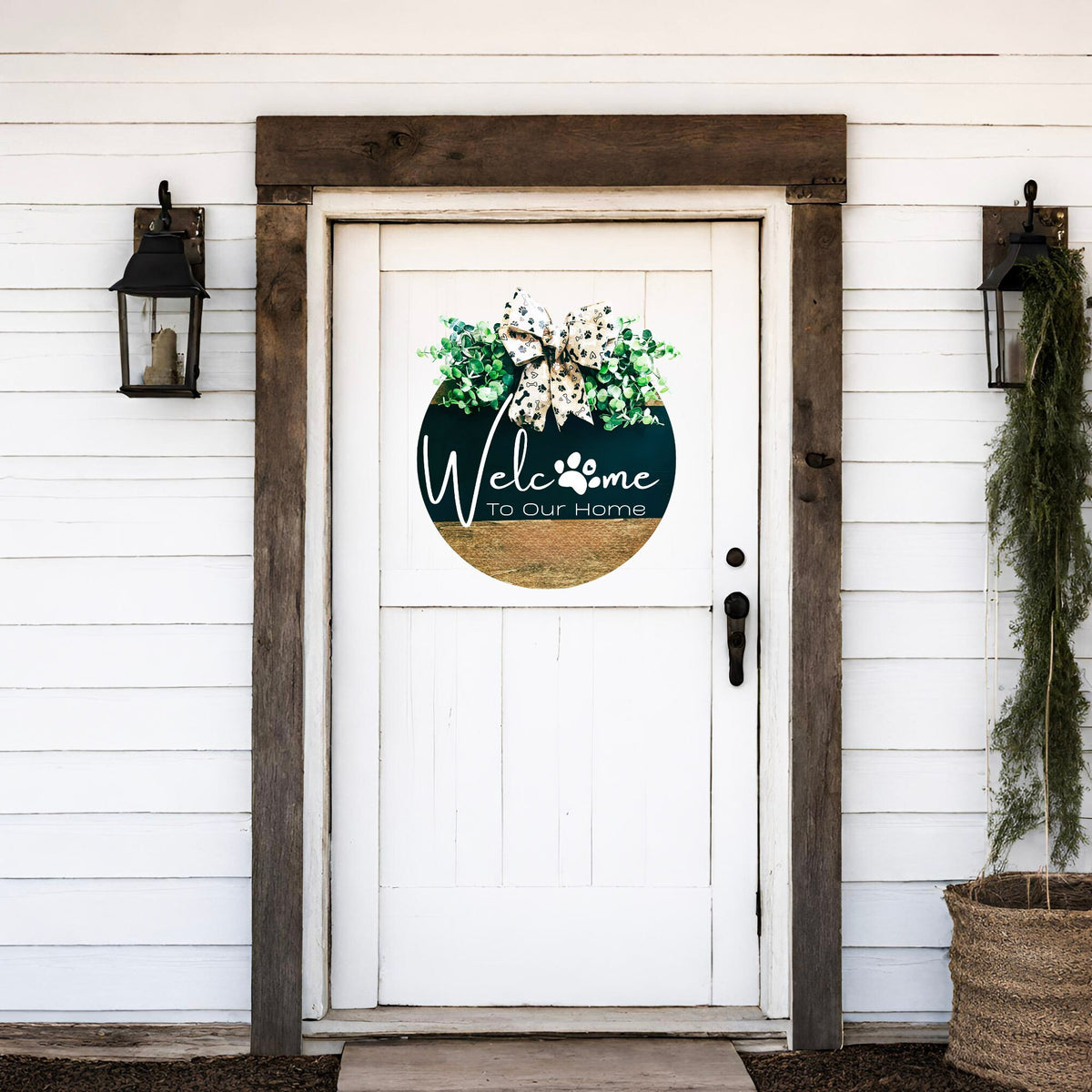 Welcome To Our Home door hanger styled on shelf with pampas grass