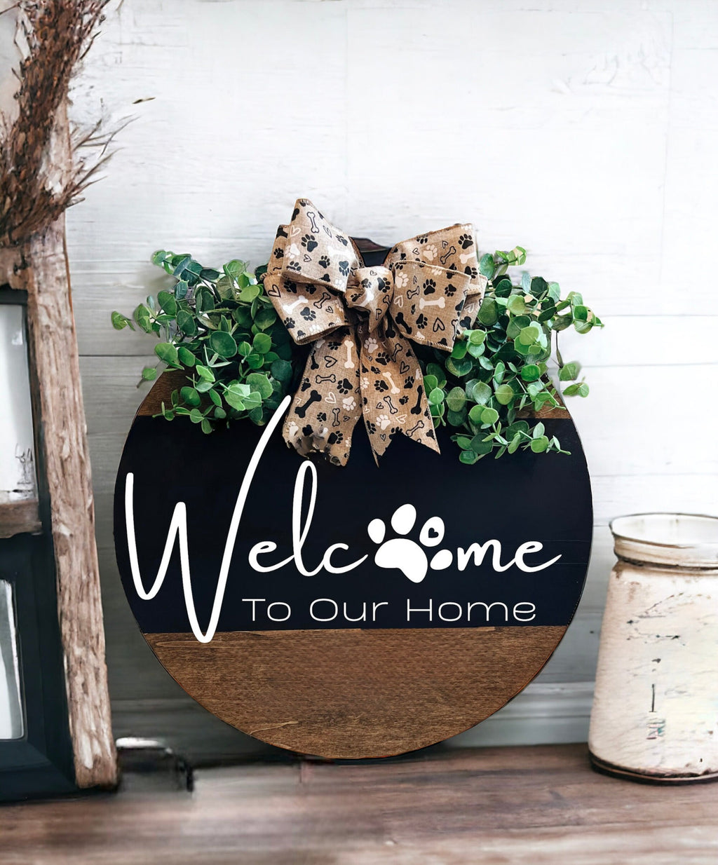 Welcome To Our Home door hanger on white farmhouse door with wood frame